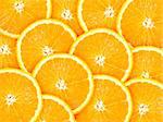 Abstract background with citrus-fruit of orange slices. Close-up. Studio photography.