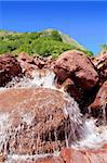 Rodeno rocks waterfal in Pyrenees La Guarrinza Aiguestortes Huesca Aragon Spain