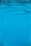 The beautiful refreshing blue swimming pool water