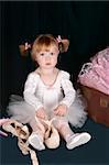 Little ballet toddler wearing a white tutu