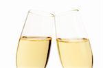 closeup of two aslope glasses with champagne isolated on white background