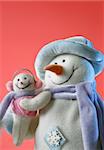 snowmen with his baby on the red background