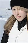 Portrait of a young girl closeup in winter