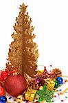 Colorful Christmas baubles and decorations next to golden tree isolated on white background with copy space.