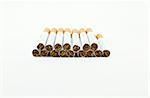 a bunch of cigarettes isolated on white