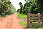 Rural gate of wood on brazilian farm, northwest of Parana State.