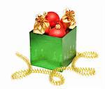 christmas baubles in gift box on white