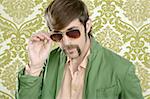 geek retro salesperson man funny mustache sunglasses in green wallpaper