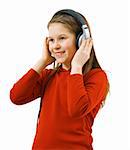 Girl listening to music in big headphones on white background