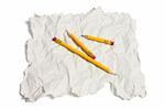 Pencils and Waste Paper on White Background