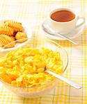 Healty breakfast  with corn flakes, cookies and tea