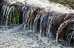 Small picturesque waterfall on a brook stream