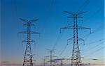 Electrical transmission towers carrying high voltage lines.