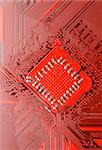 Red circuit board close up. Electronic background