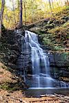 Autumn Waterfall in mountain with foliage. Bridesmaid Falls from Bushkill Falls, Pennsylvania.