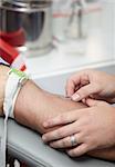 close up of blood extraction in lab