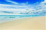 Beautiful white sand tropical beach at day time