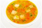 Fish soup with pike perch and salmon isolated on a white