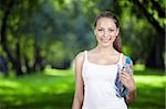 Young attractive girl with a bottle of water