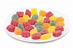 Fruit jellies on plate insulated on white background