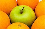 Close up of half cut oranges and apples