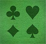 Green poker carpet with cards forms