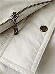 pocket flap fragment with metal button and zipper