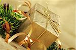 Christmas gift box with golden ribbon