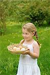 Little girl holding fresh eggs