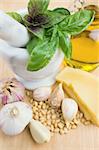 Basic ingredients for cooking Italian basil pesto sauce close-up