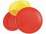 colorful disposable plates on white