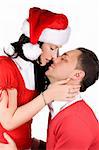 Young couple in love dressed in red christmas clothes