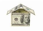 House built with Dollar money bills isolated on white background with clipping path