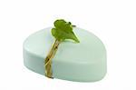 green soap with leaf on white background