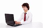 young businessman on the computer on a white background. Studio shot