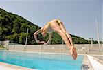 beautiful young woman at swimming pool