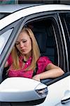 Woman Sitting In Car Getting Ready To Drive