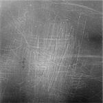 Medium format film frame with heavy scratches, dust and grain