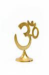 Figure of golden indian symbol aum. isolated on white background