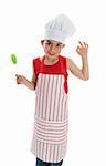 A young smiling child chef in apron and chef hat with an okay hand sign.  White background.