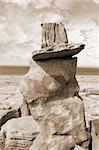 boulders in rocky landscape of the burren in county clare ireland in sepia