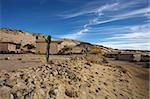 Coast of Southern Morocco with the Atlantic Ocean and a few bungalows with the desert all around