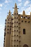 Details of the big mosque in Djenné  and the traditional mud building in Mali.