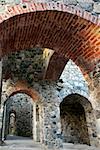 Interior of ancient stone ruin witharches