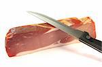 smoked bacon with a knife on a white background
