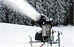 Closeup of the snow making machine in action with control pannel.