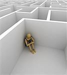 Depressed mannequin sitting in the corner of a big maze