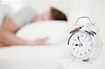 Close up of alarm clock on bedside table