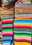 Mexican serape colorful stacked and charro hats mariachi