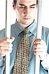 Isolated business man in jail